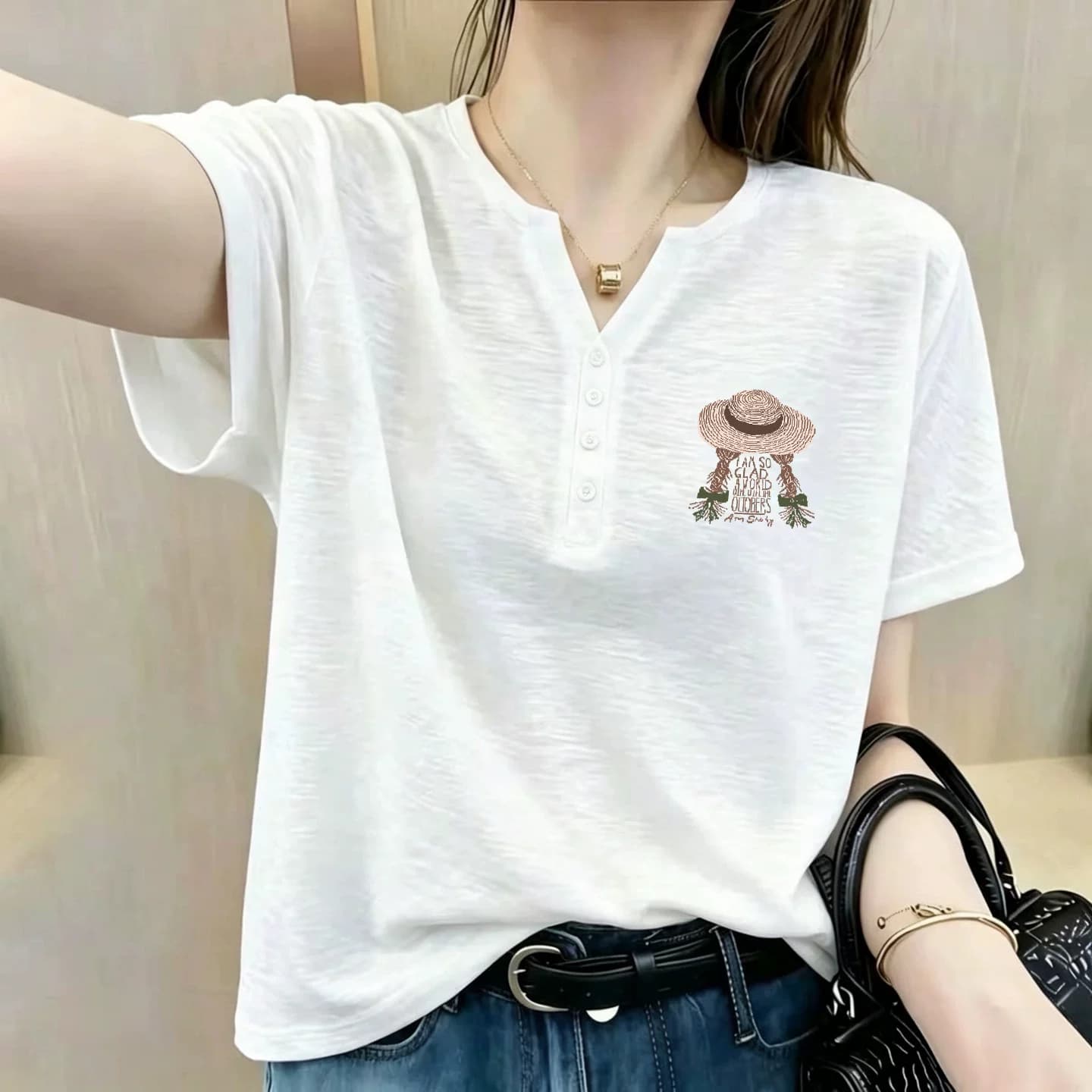 White Age-Reducing Printed Slub Cotton Short-Sleeve Women's T-Shirt 2026 Summer V-Neck Loose Button Design Versatile Top